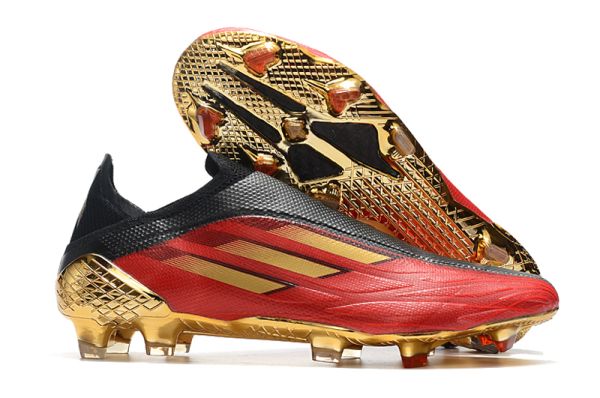 gold and red football cleats