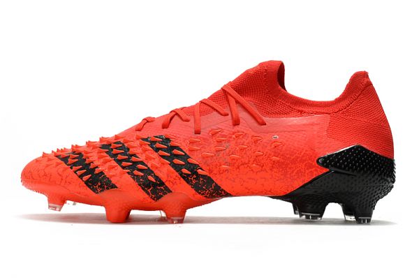 red and black soccer cleats